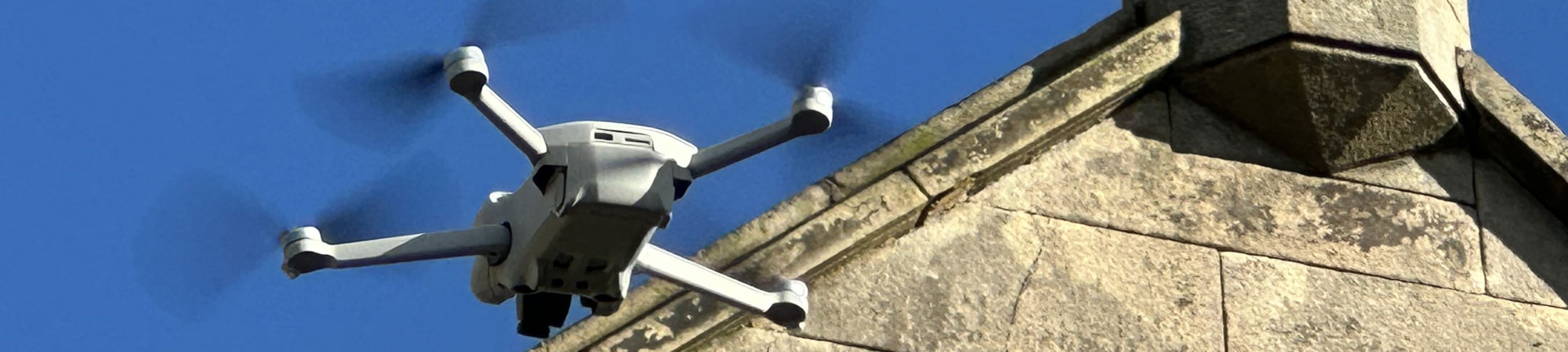 Drone flying above rural building in Shropshire